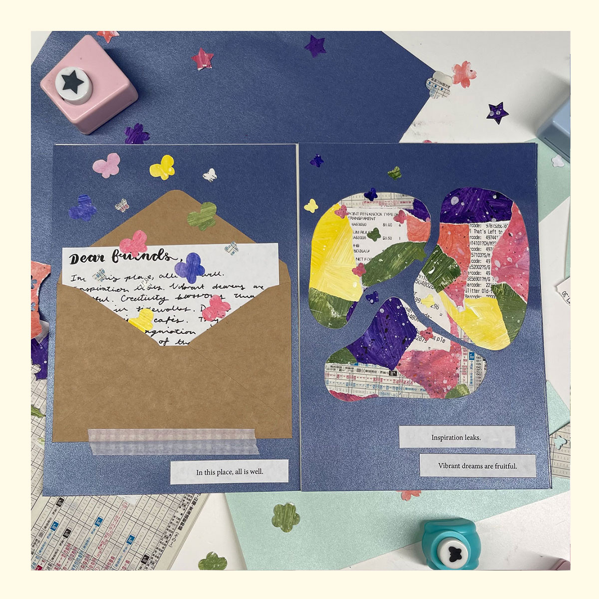 the first spread of a zine called 'my fortunate town' surrounded by the materials it is made with (pearl paper, painted collage paper, paper cut outs, train timetables)